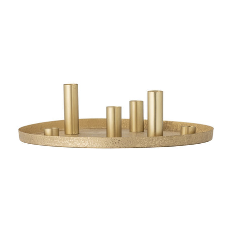 Maxime Iron Christmas Candle Holders Set of 7 in gold, round textured tray with six cylindrical candle holders in varying heights, shown on a white background.