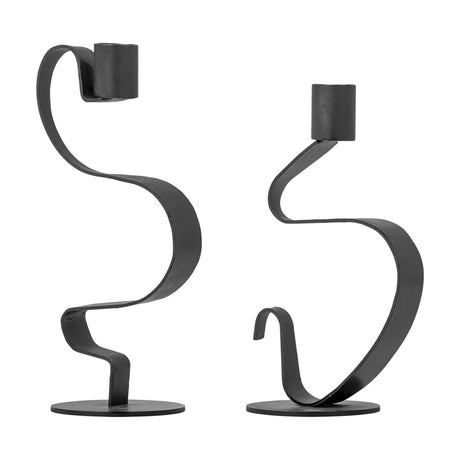 Do Iron Candle Holders Set of 2 in black, each with a flat metal ribbon spiralling up to a candle cup on a round base, shown at different heights on a white background.
