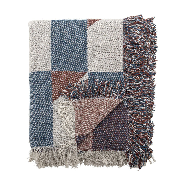 Folded True Checked Cotton Throw in multicoloured blue, rust and cream block check with thick shaggy fringe, shown against a plain white background.