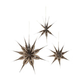 Ilo Paper Christmas Stars Set of 3 in brown, three layered paper star decorations with tapering pierced points in varying sizes, shown hanging on a plain white background.