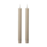 Ponza LED Candles Pack of 2 in beige paraffin wax, tall ribbed columns with flame-shaped white tips, set on a plain white background.