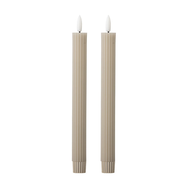Ponza LED Candles Pack of 2 in beige paraffin wax, tall ribbed columns with flame-shaped white tips, set on a plain white background.