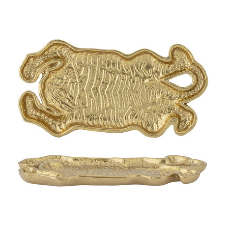 Lester Tiger Cast Iron Tray in gold, shaped like a flattened tiger with outstretched legs and a looped tail, textured stripe detailing, shown top-down and side-on against a white background.