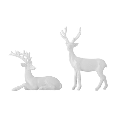Pranzer Resin Christmas Decorations, set of 2 white polyresin deer figures with antlers, one standing and one lying down, on a plain white background.