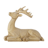 Pranzer resin Christmas decoration, a gold resting deer figurine with folded legs, lifted head, and branching antlers, textured fur finish, 20cm tall on a plain white background.