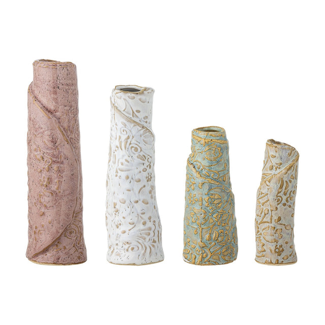 Set of four Temple Embossed stoneware vases in pink, white, sage and cream, each with a swirling leaf pattern and a rolled, folded silhouette, shown in ascending heights on a plain white background.
