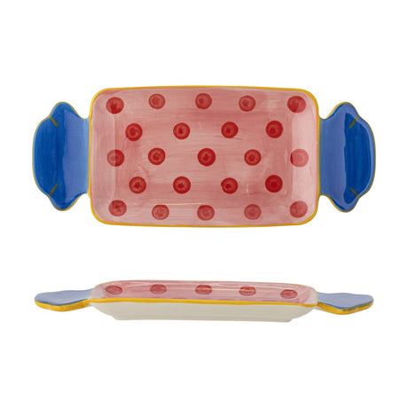 Caramella stoneware serving platter shaped like a wrapped sweet, with blue twisted ends and a pink polka-dot centre, shown top and side view on a white background.