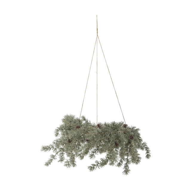 Cedar Artificial Christmas Wreath, 70cm, flat-hanging ring of frosted green cedar sprays with small pinecones, suspended on jute cords against a plain white background.