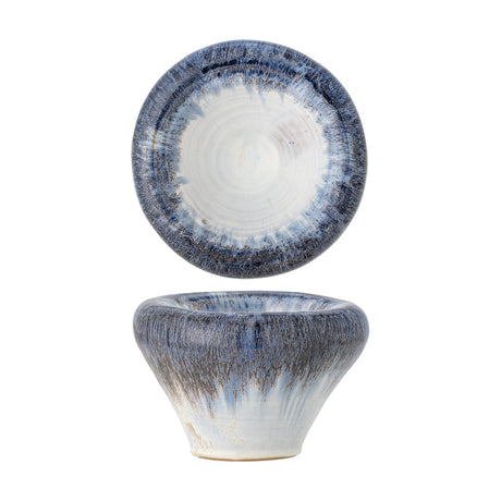 Finna Stoneware Bowl 17cm in Blue, shown from above and in profile, with a tapered ceramic body, small foot, and rolled rim in deep blue drip glaze over white, on a plain background.