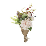 Splendor Artificial Bouquet in pink featuring a large multi-petalled dahlia with fern fronds, berries and small buds, wrapped in a paper sleeve tied with ribbon, on a plain white background.