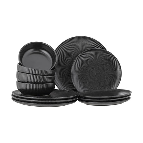 Neri Ribbed Stoneware Dinner Set of 12 in black, with ribbed dinner plates, smaller side plates and stacked bowls featuring ribbed exteriors, shown on a plain white background.