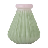 Judith Ribbed Glass Vase 24.5cm in green, with deep vertical ribs on a wide, tapered body and a rounded pink-tinted rim, shown against a plain white background.