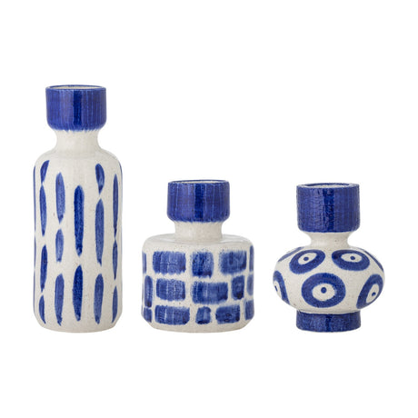 Romane Stoneware Vases Set of 3 in Blue on a white background: a tall vase with vertical stroke patterns, a squat cylinder with brushed blocks, and a bulbous vase with bold circles.