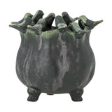 Charlize Stoneware Plant Pot in green reactive glaze, with small modelled birds around the rim, a rounded lobed body on short feet, shown on a plain white background.