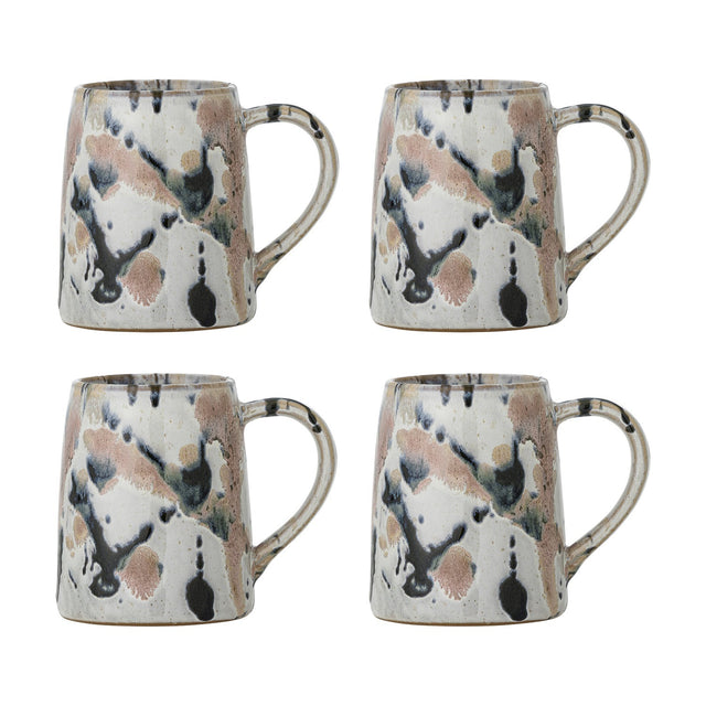 Set of four Winnie stoneware mugs with looped handles, each in a multicoloured reactive glaze showing black, pink and grey splashes and speckles, shown on a plain white background.