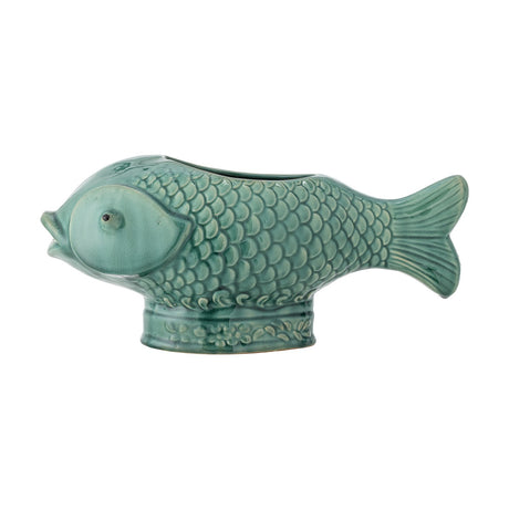 Hiro Fish Stoneware Plant Pot in green reactive glaze, with raised scale detail, fanned tail ridges, rounded gill eyes, and a floral-banded foot, shown on a white background.