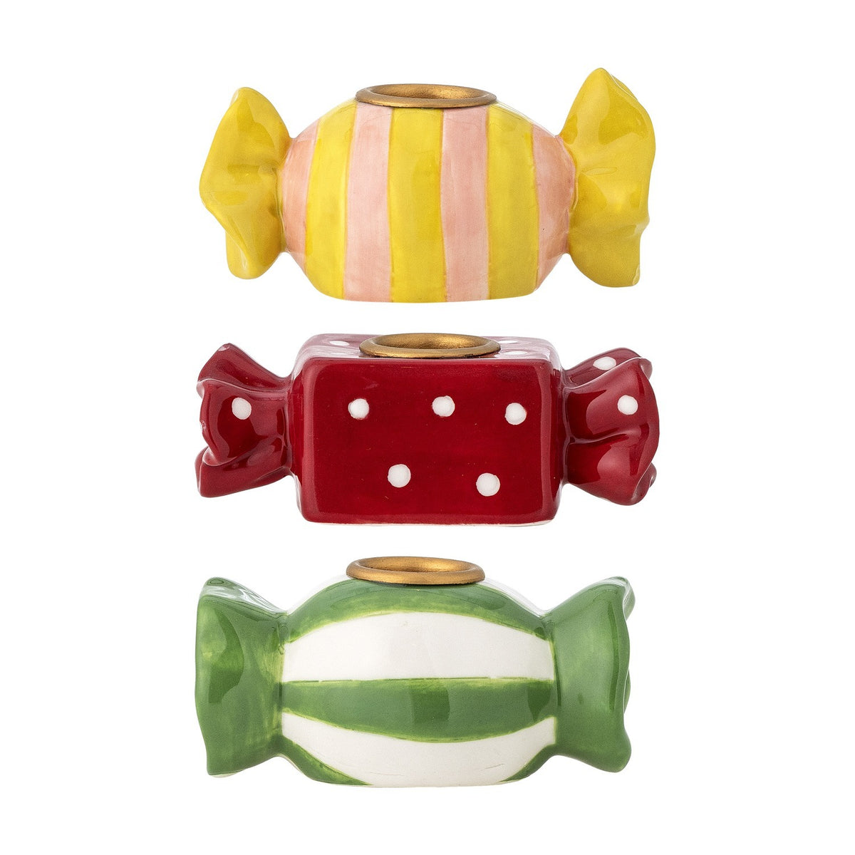Set of three stoneware candle holders shaped like wrapped sweets with twisted ends in yellow-peach stripes, red polka dots, and green-white bands, each with a brass-tone candle cup.