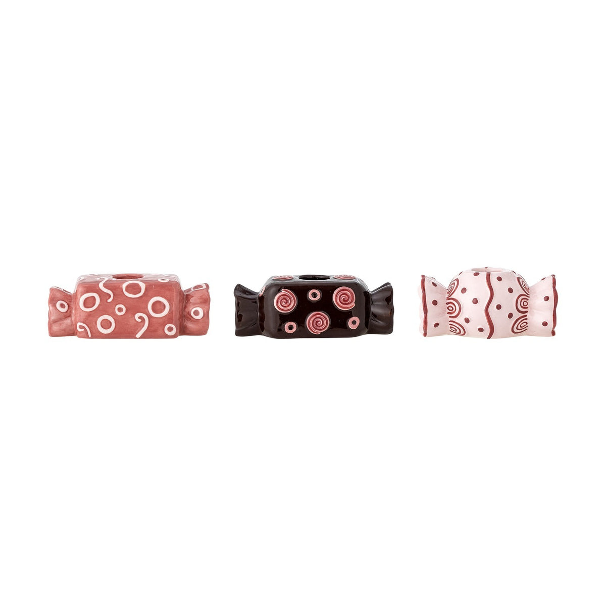 Set of three Maiano ceramic candle holders in pink, dark brown and pale pink, featuring embossed swirl and dot patterns with twisted ends and taper candle sockets.