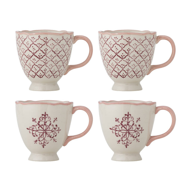 Set of 4 stoneware Wonderland Christmas mugs, 525ml, cream with pink scalloped rims and handles, two in a diamond trellis pattern and two with a pink floral motif, footed bases, on a white background.