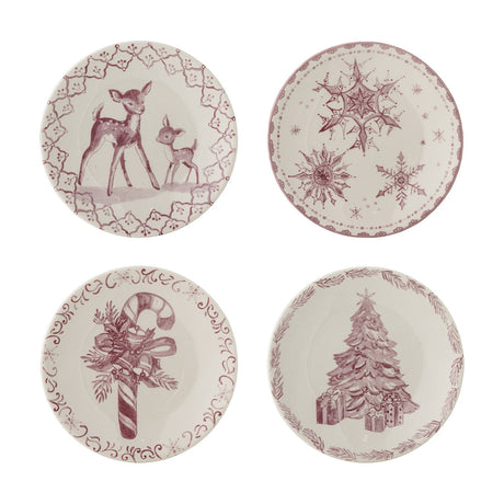 Set of four stoneware Christmas plates in pink and white with deer, snowflakes, candy cane and holly, and a decorated tree design, each with a patterned border.