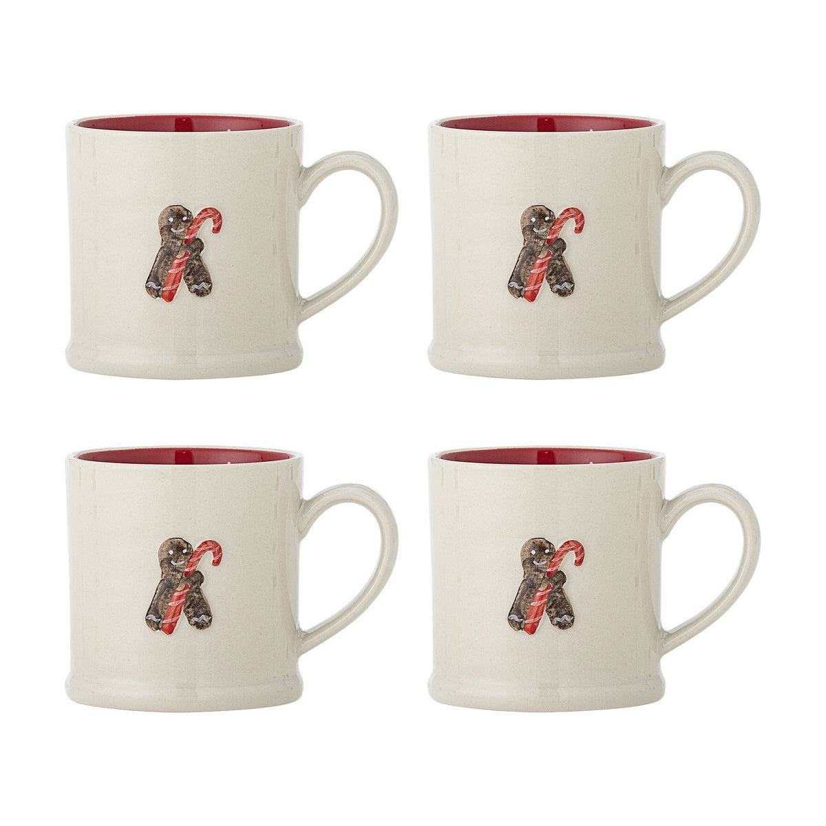 Set of four Kenai cream stoneware Christmas mugs with embossed gingerbread and candy cane design, red interior glaze, on a white background.