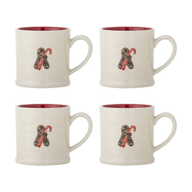 Set of four Kenai cream stoneware Christmas mugs with embossed gingerbread and candy cane design, red interior glaze, on a white background.