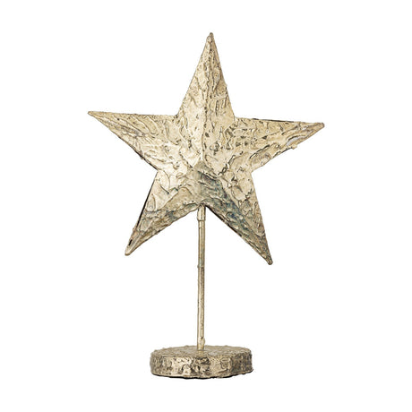 Nilos Star Iron Christmas Decoration in brass, a five-pointed star with hammered, textured surface on a slim stem and round base, shown against a white background.