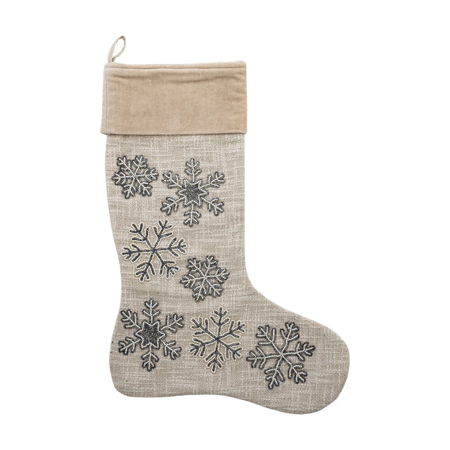 Ahsan Snowflake Cotton Christmas stocking in beige, woven fabric body with embroidered snowflakes and a folded velvet cuff, hanging loop at top, on a white background.