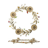 Gold iron Advent candle holder wreath with four flower-shaped candle cups, leaf sprigs, and multicoloured faceted accents, shown upright and flat on a white background.