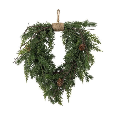 Pine Heart Christmas Decoration in green, a heart-shaped artificial pine wreath with pinecones, twigs and a jute rope hanging loop, shown on a white background.