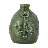 Ramia Floral Stoneware Vase in green, 13.5cm, rounded uneven body with short neck and raised floral relief design, shown on a plain white background.