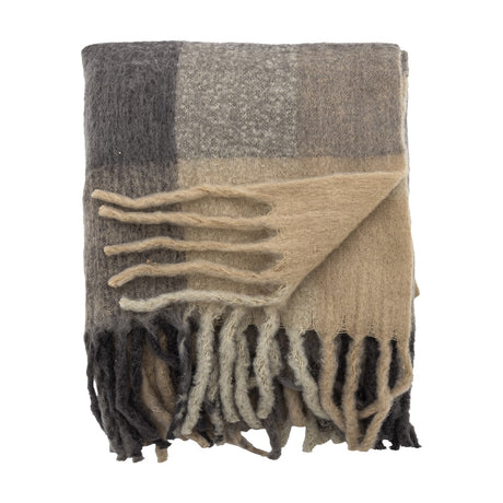 Hamisha Grey Throw in a folded block check of charcoal, grey, and beige, with long chunky fringe, shown on a plain white background.