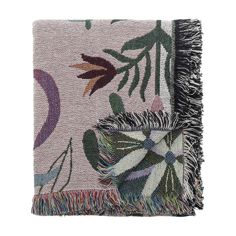 Yash Cotton Throw in multicoloured woven cotton, folded to show a botanical leaf and flower pattern with fringed edges, on a plain white background.