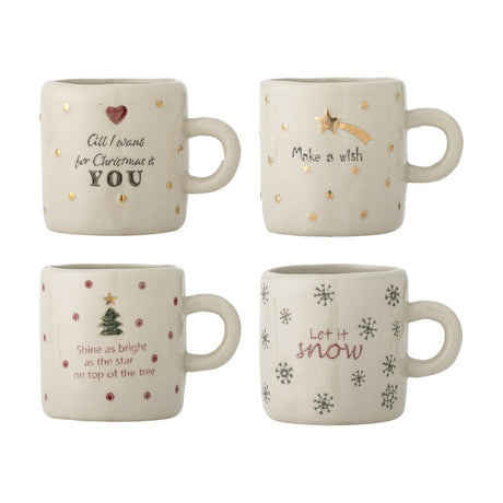 Christy stoneware Christmas cups, set of 4 in cream, each with festive text and motifs: heart, shooting star, Christmas tree, and snowflakes, on a plain white background.