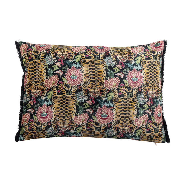 Lester Cotton Cushion in Multi, a rectangular lumbar cushion featuring a printed tiger, floral and leaf pattern in gold, pink and teal with a frayed black edge, shown on a white background.