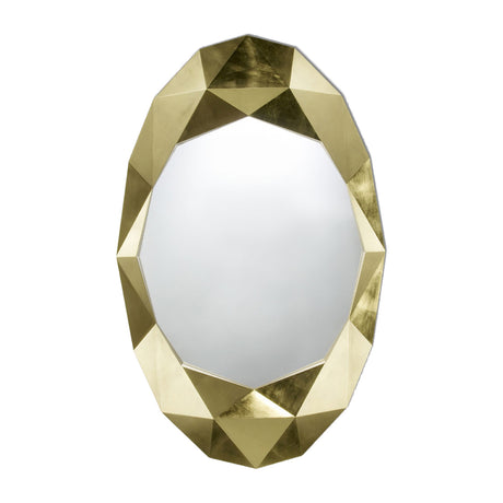 Oval mirror set within a chunky faceted surround finished in hand applied gold leaf, an irregular outline on a plain background.
