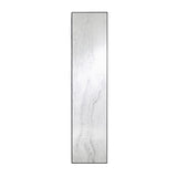 Tall narrow rectangular mirror printed with a pale grey stone pattern, held in a slim black metal frame, on a plain background.