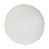 Round mirror ringed by small gold discs set at even intervals around the whole edge, on a plain white background.