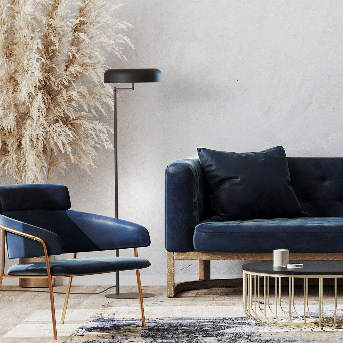 Rea 3 Light Dome Adjustable Swing Arm Floor Lamp in matt black, shown beside a navy sofa and armchair in a living room setting.