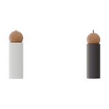 Rocio Wood Pendant Light in matt white, shown beside a dark bronze version, each with a cylindrical shade and ash wood ball top, on a plain white background.