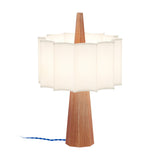 Rain Scalloped Fabric Table Lamp in Chestnut, featuring a tapered wood base, central spire, and white scalloped fabric shade with blue textile cable, on a plain white background.