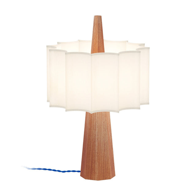Rain Scalloped Fabric Table Lamp in Chestnut, featuring a tapered wood base, central spire, and white scalloped fabric shade with blue textile cable, on a plain white background.