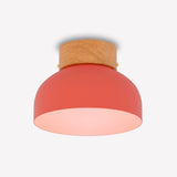 Reiko Dome Flush Ceiling Light with wood base, red aluminium dome shade and natural ash wood mount, shown on a plain white background.