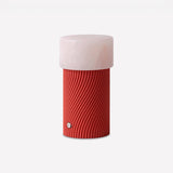 Rizzo LED Alabaster Rechargeable Table Lamp with natural alabaster shade and ribbed, spiral-textured red Sapelly base, shown on a plain white background.