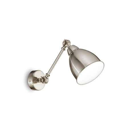 Introducing the Simply Wall Light - Nickel, a sleek metallic lamp designed for wall mounting. It features an adjustable arm and a cone-shaped shade in a modern industrial style, providing versatile illumination that enhances any space. Displayed against a plain white background, its nickel finish adds elegance to your decor.