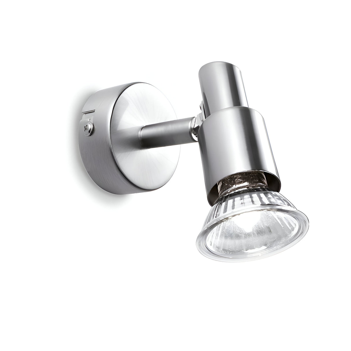 Product Name: Crest Single Spotlight - Nickel

A contemporary nickel wall-mounted spotlight, the Crest Single Spotlight - Nickel features a cylindrical base and an adjustable head, crafted to direct energy-efficient lighting precisely. It emits a bright, focused beam, making it perfect for highlighting specific areas within a room.