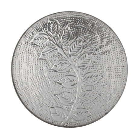 Leila Floral Iron Tray in silver, a round tray with a low rim, embossed leafy branch design, and dotted textured background, shown on a plain white surface.