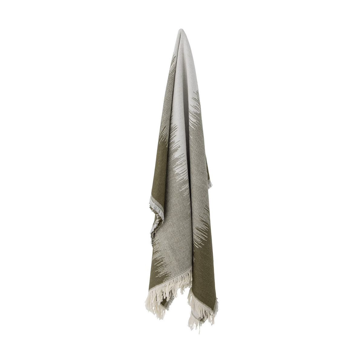 Lucienne Throw in green, woven fabric draping with fringed edges, fading from solid green to light grey with a flecked grass-like pattern, shown against a plain white background.