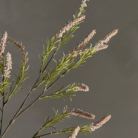 Foxtail Artificial Stem 76cm in pink, showing branching sprays with needle-like leaves and textured bristly flower spikes, set against a plain grey background.