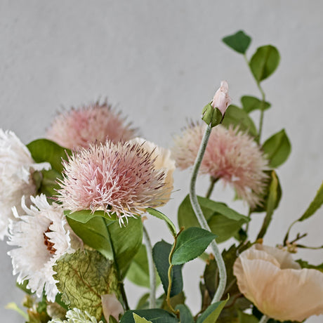 Chrysanthemum Artificial Stem 100cm in Pink, close-up of round spiky pink blooms and buds with green leaves on fabric branching stems, light grey background.